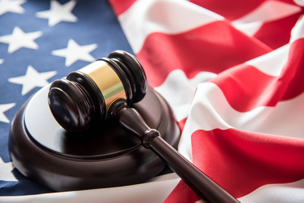 Gavel and American flag representing court records
